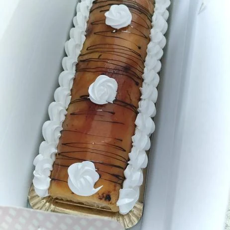 Brazo de crema tostada