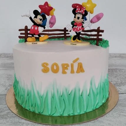 Tarta infantil de Mickey y Minnie con césped modelado